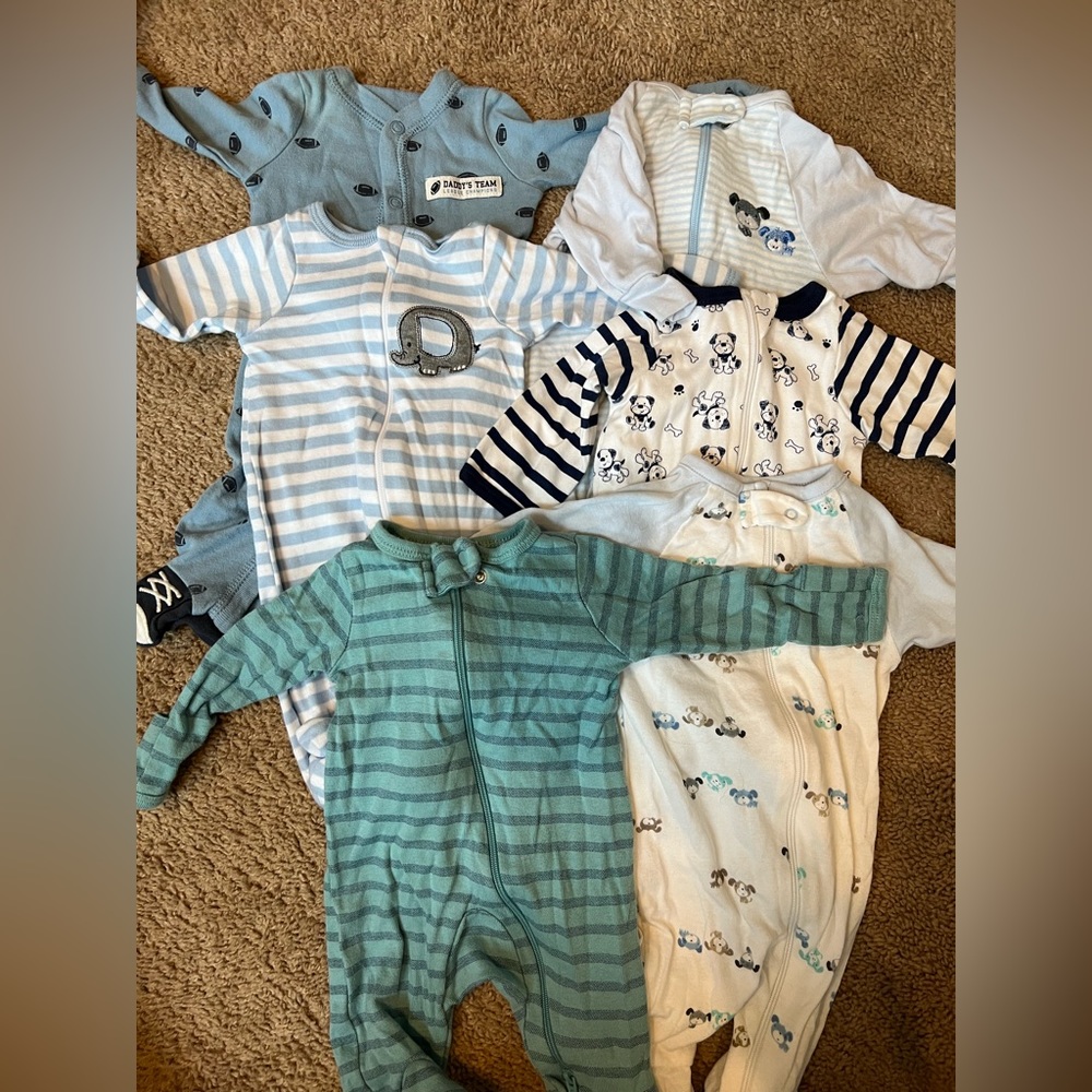 Six newborn boy footed zip sleepers